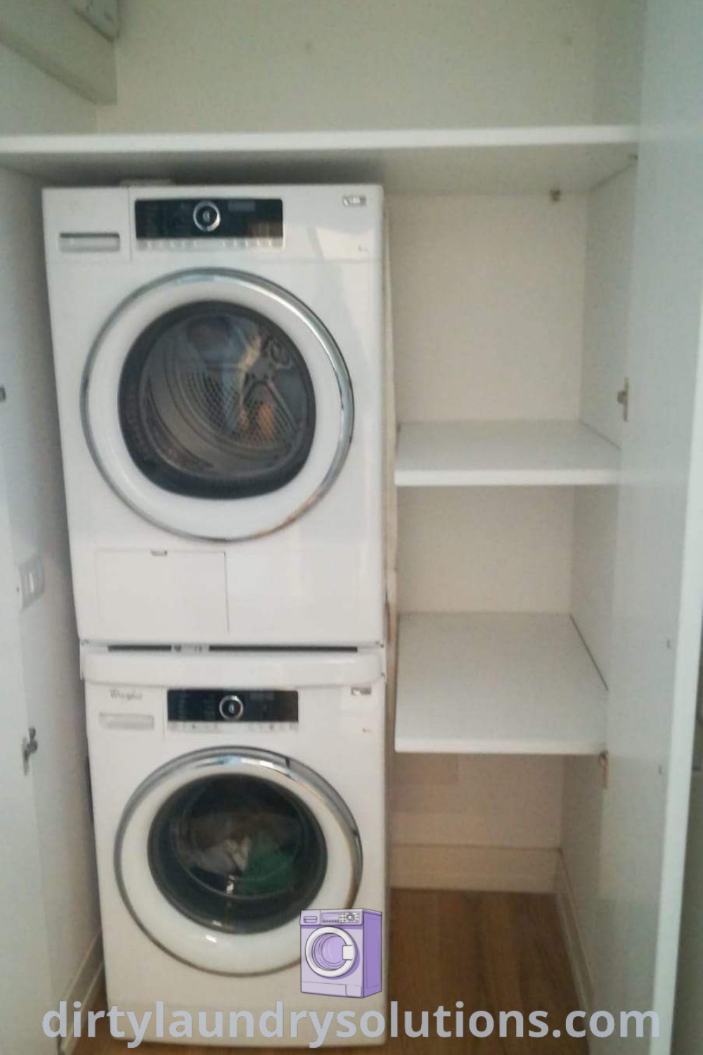 A stackable washer dryer in a small closet, showcasing a contemporary design ideal for laundry rooms and small spaces. Explore cozy ideas and organization solutions for your home at dirtylaundrysolutions.com.
