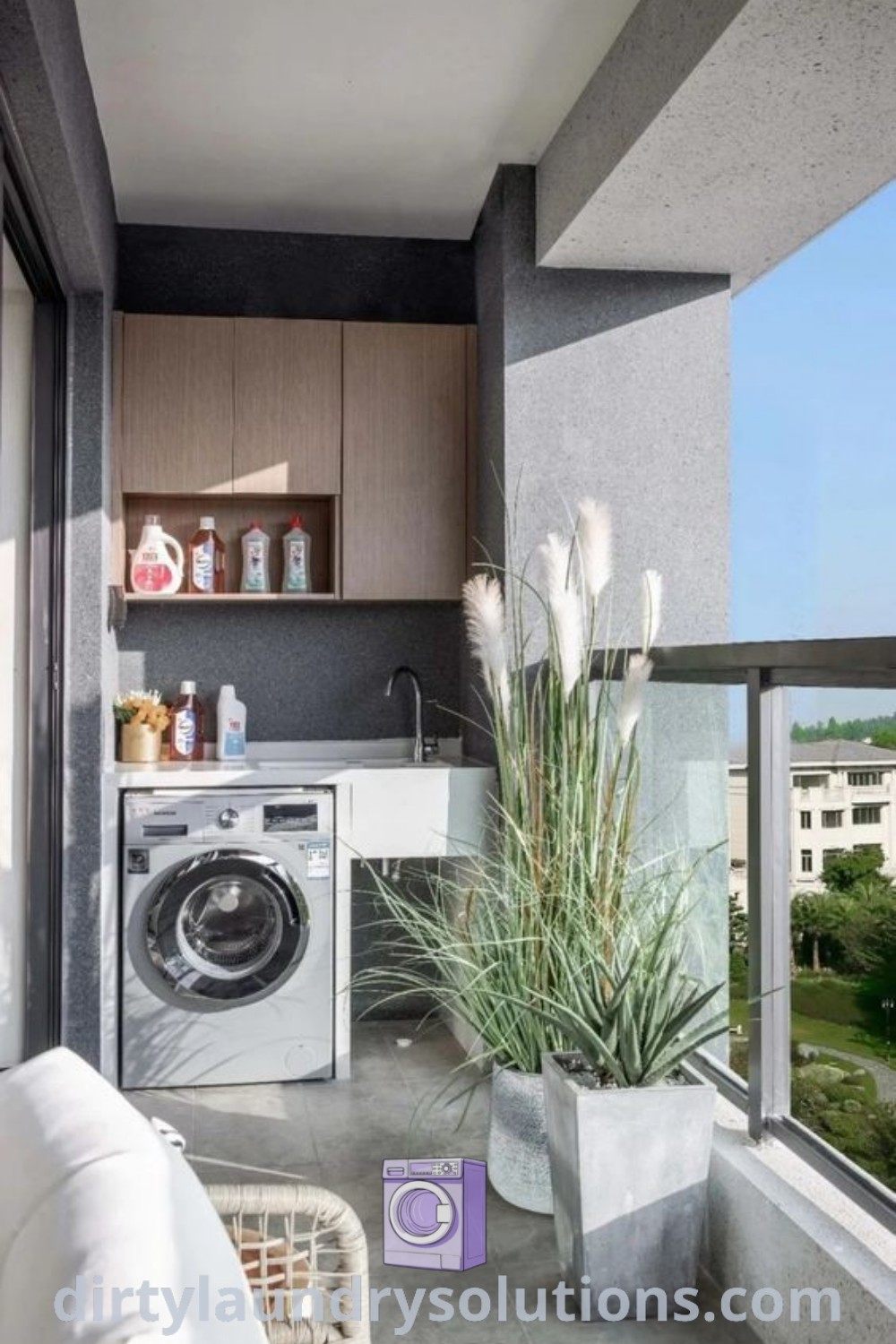 An outdoor laundry area with a washer and dryer in a small room, featuring a balcony that overlooks the city. It showcases outdoor laundry options and modern designs for busy homes. Find inspiring ideas and organization solutions at dirtylaundrysolutions.com.