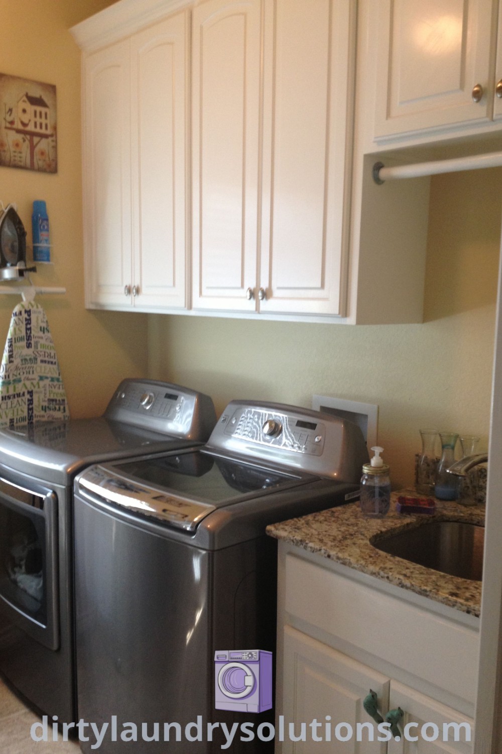 A cozy laundry room in a small basement featuring a washer and dryer, organized storage solutions, and inviting decor. Discover laundry room inspirations and ideas for small spaces at dirtylaundrysolutions.com.
