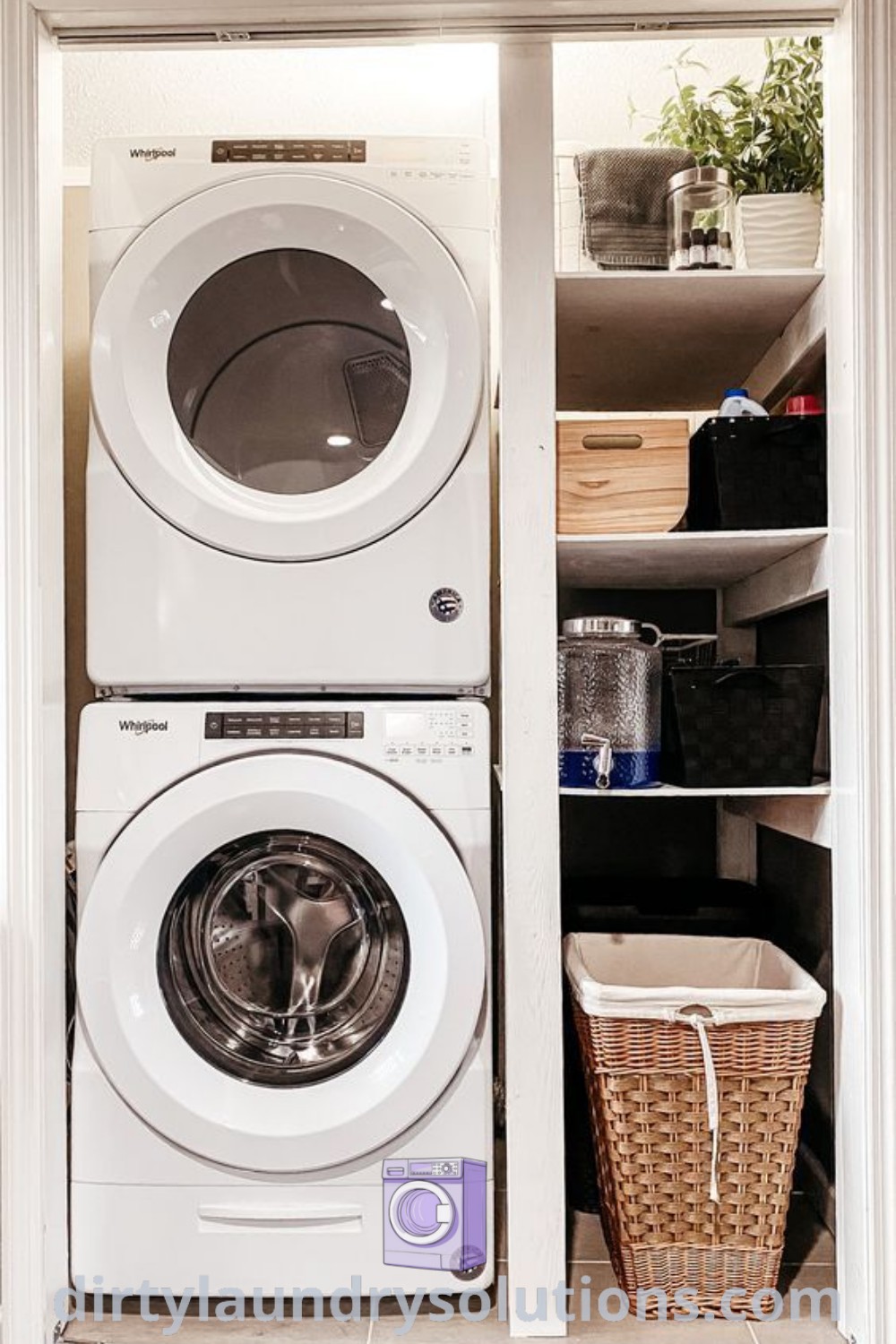 A washer and dryer stacked in a closet next to each other, with baskets on the floor, providing a cozy and functional laundry solution. Discover inspiring ideas for small spaces at dirtylaundrysolutions.com.