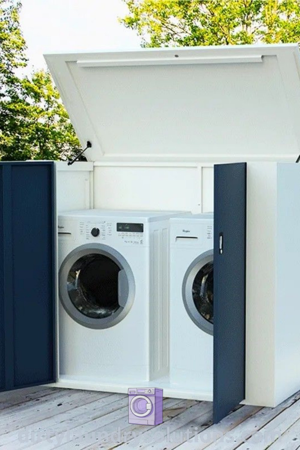 An open washer and dryer situated on a wooden deck surrounded by trees, showcasing an inspiring outdoor laundry area. Discover more about creating a cozy laundry shed with unique ideas and solutions at dirtylaundrysolutions.com.