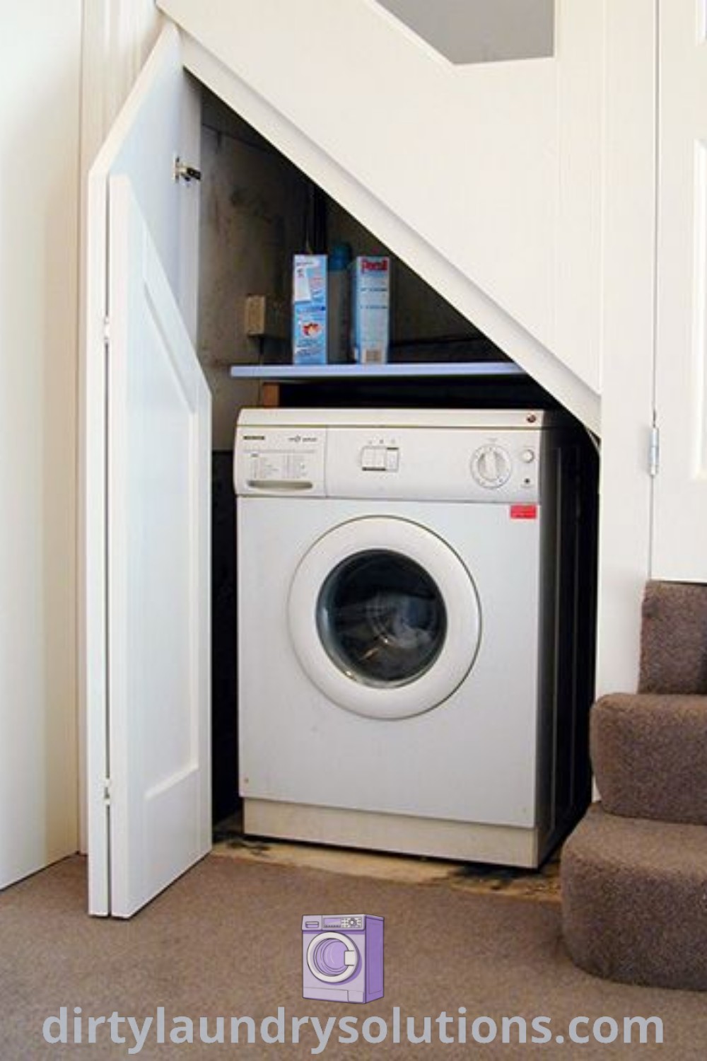 A washer and dryer situated under a staircase in a cozy laundry space, demonstrating unique ideas for under stair storage and organization. Discover more design inspirations for small homes at dirtylaundrysolutions.com.