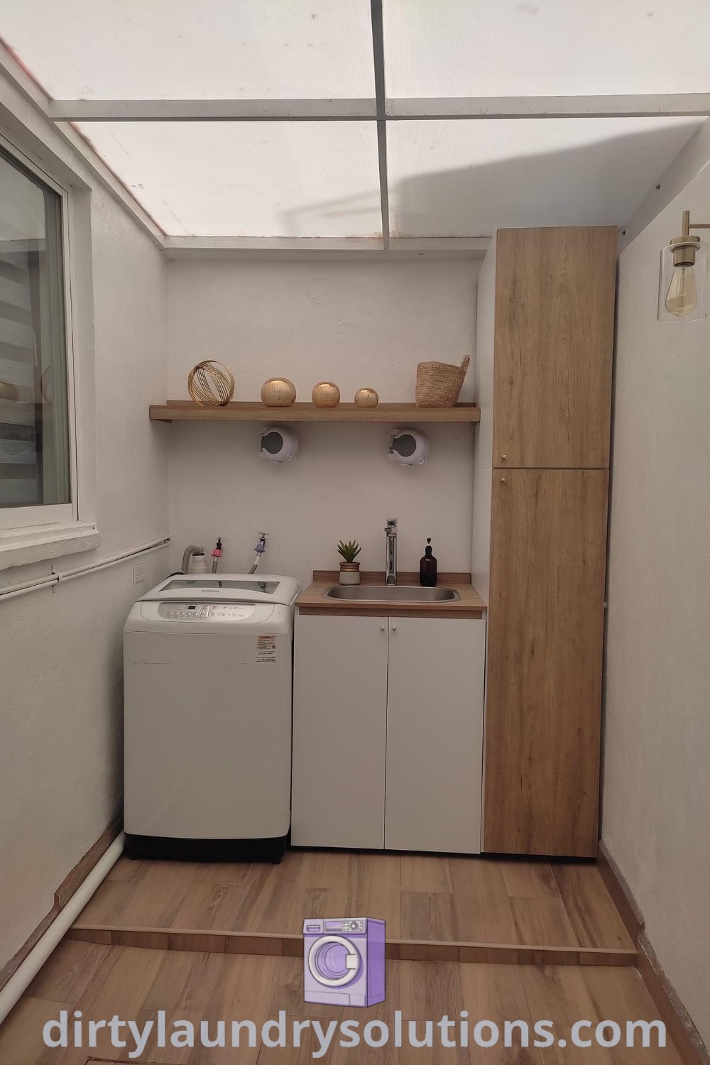 An outdoor laundry room with a clean and organized layout featuring stylish appliances, perfect for maximizing small spaces. Discover inspiring design ideas and solutions for your home at dirtylaundrysolutions.com.