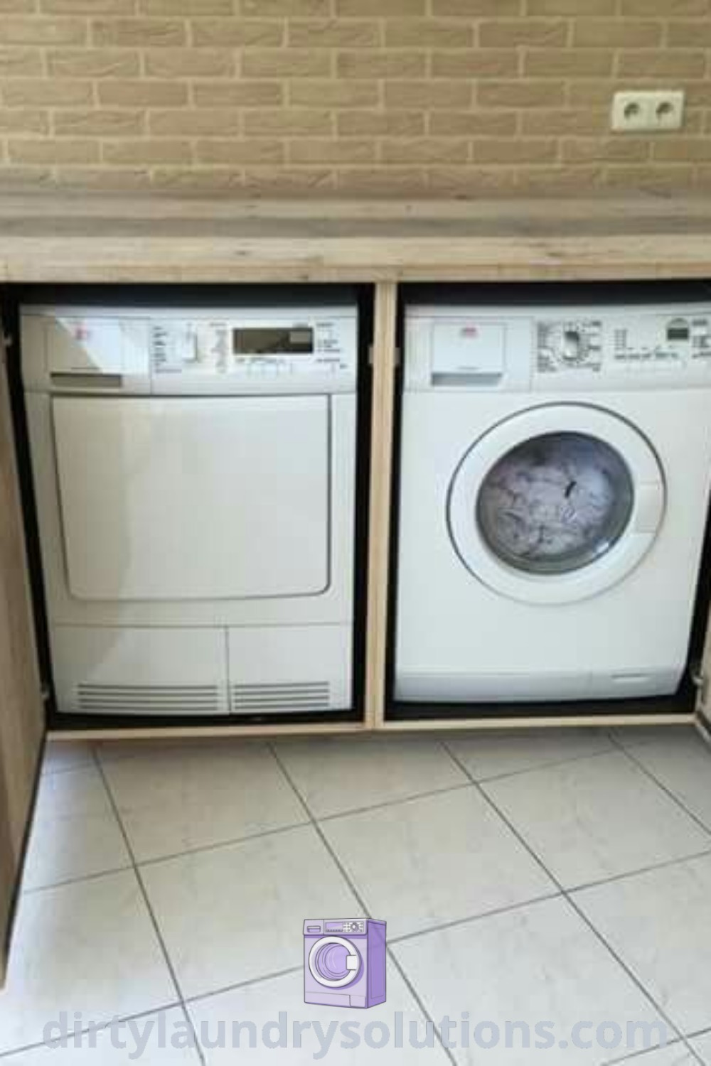 A washer and dryer situated inside a cabinet, showcasing stylish washing machine cupboard ideas for apartment laundry decor and outdoor laundry areas. Explore unique organization solutions at dirtylaundrysolutions.com.