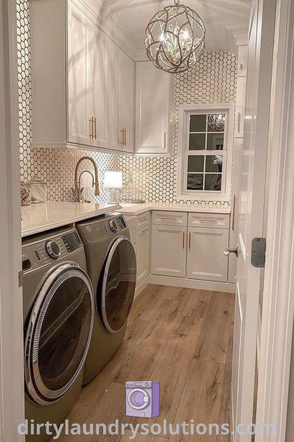 A washer and dryer in a cozy kitchen next to each other on a hardwood floor, illustrating beautiful laundry room design ideas. Discover more cozy home inspirations and practical solutions at dirtylaundrysolutions.com.