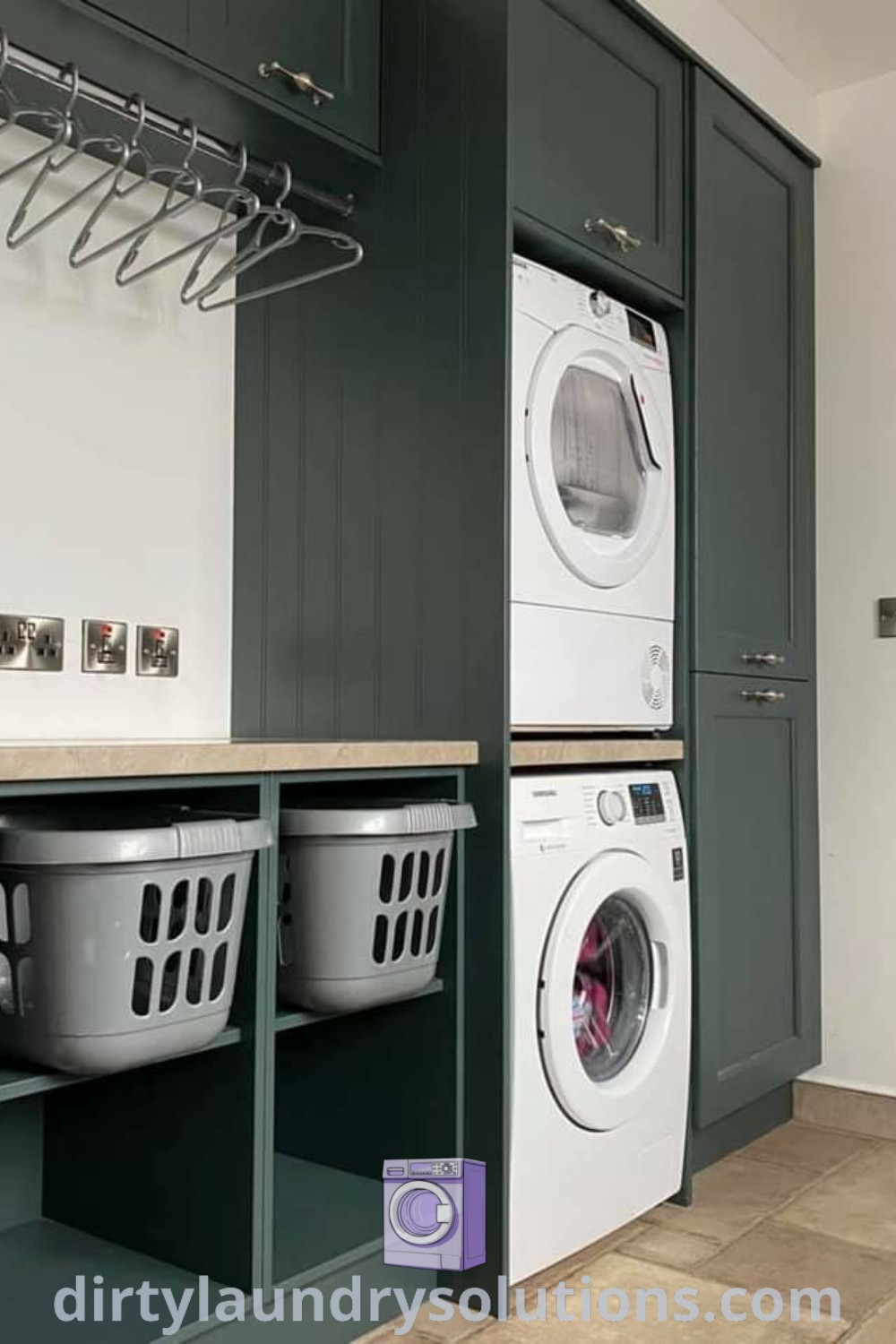 A stylish laundry room featuring a washer and dryer adjacent to cabinets with hanging hooks, illustrating practical utility room designs. Discover inspiring ideas for your home at dirtylaundrysolutions.com.