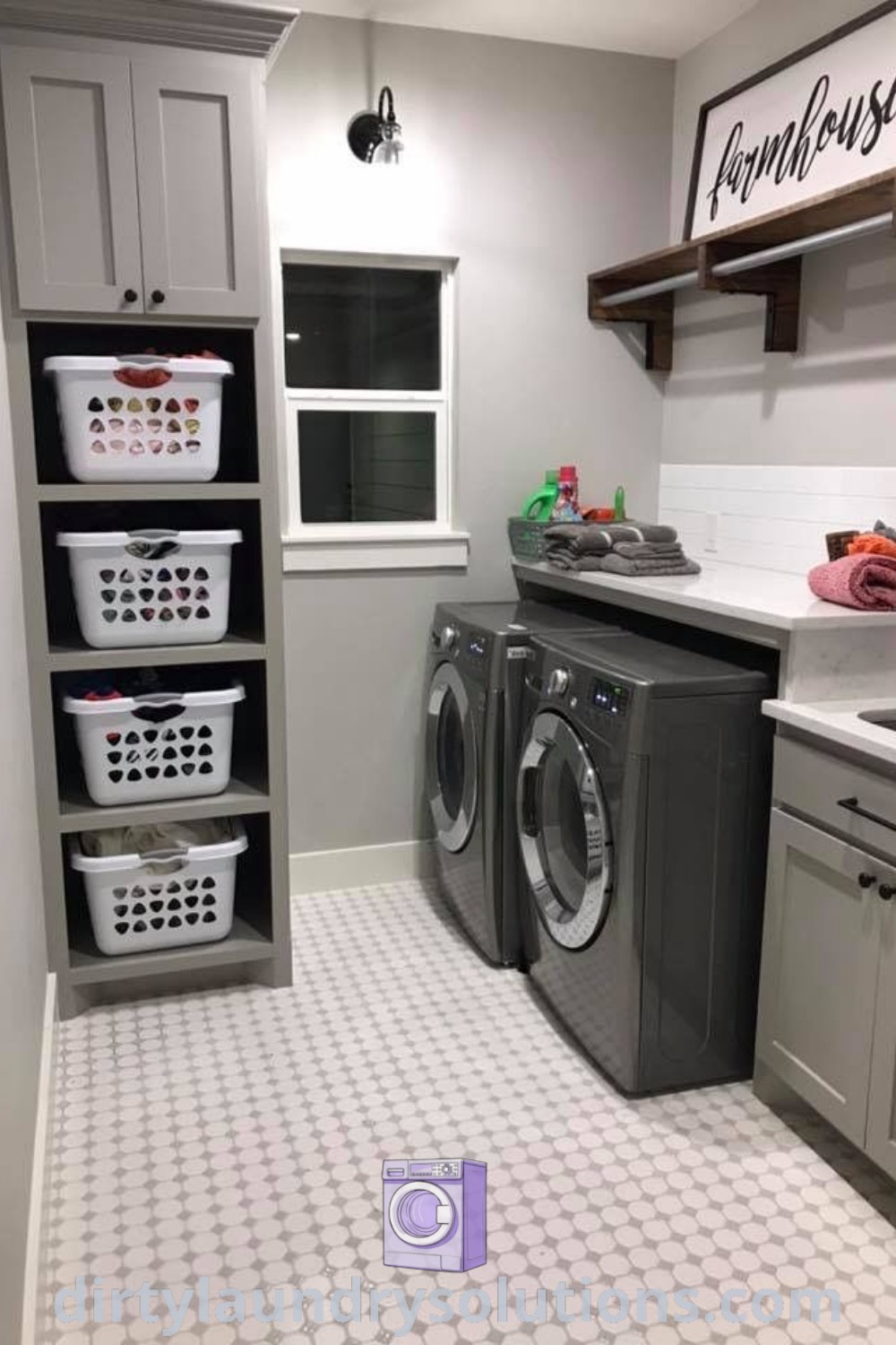 A small room featuring a washer and dryer with tile flooring, demonstrating cozy laundry room ideas, including storage solutions such as folding tables and cabinets. Discover practical and inspiring ideas for your home at dirtylaundrysolutions.com.