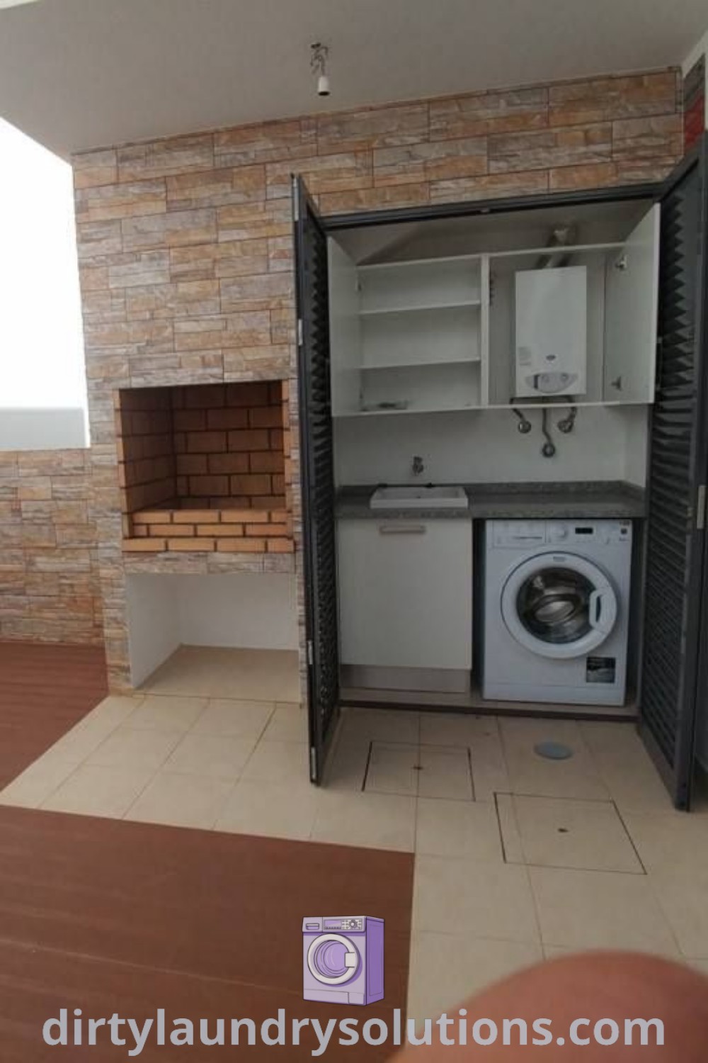 An outdoor laundry room with a washer and dryer next to a brick wall, showcasing cozy design ideas for small spaces. Discover more creative outdoor laundry solutions at dirtylaundrysolutions.com.