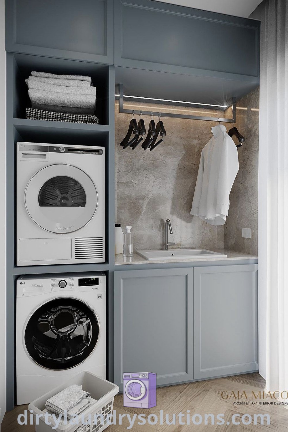 A laundry room featuring a washer and dryer with blue cabinets, showcasing stylish organization ideas for small utility rooms. Discover inspiring and unique solutions for your home at dirtylaundrysolutions.com.