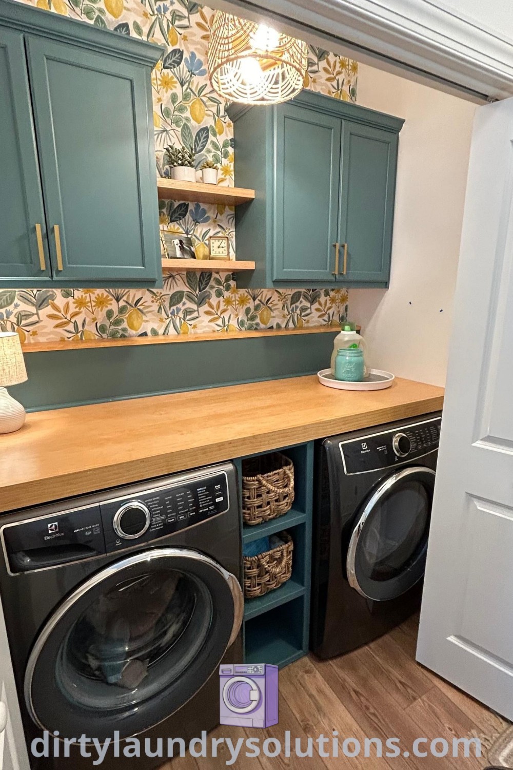 A cozy laundry room featuring a washer and dryer in a small space with green cupboards, demonstrating unique ideas for organization and design. Find inspiring solutions for your laundry room at dirtylaundrysolutions.com.