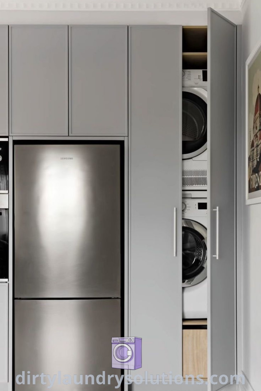 A stainless steel refrigerator freezer in a kitchen next to a stacked washer and dryer, showcasing inspiring laundry room ideas and hidden laundry cabinet designs. Discover more cozy kitchen solutions at dirtylaundrysolutions.com.