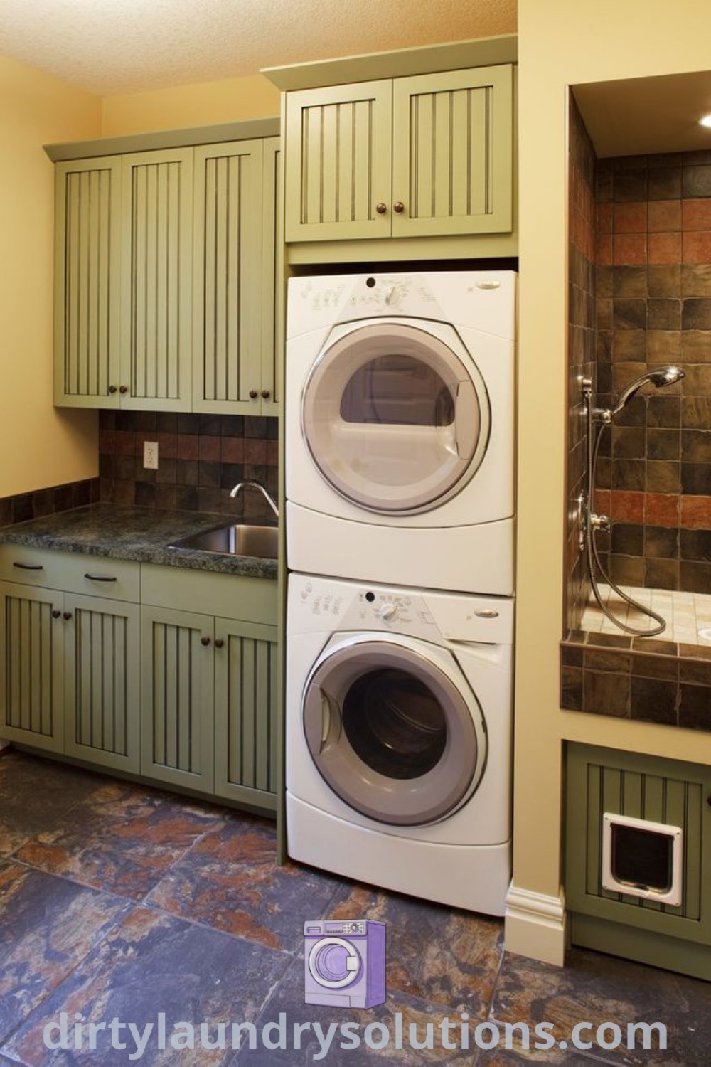 An eclectic laundry room featuring a washer and dryer, a dog wash station, and organized storage solutions, providing functional benefits for busy homes. Explore more design ideas and solutions at dirtylaundrysolutions.com.
