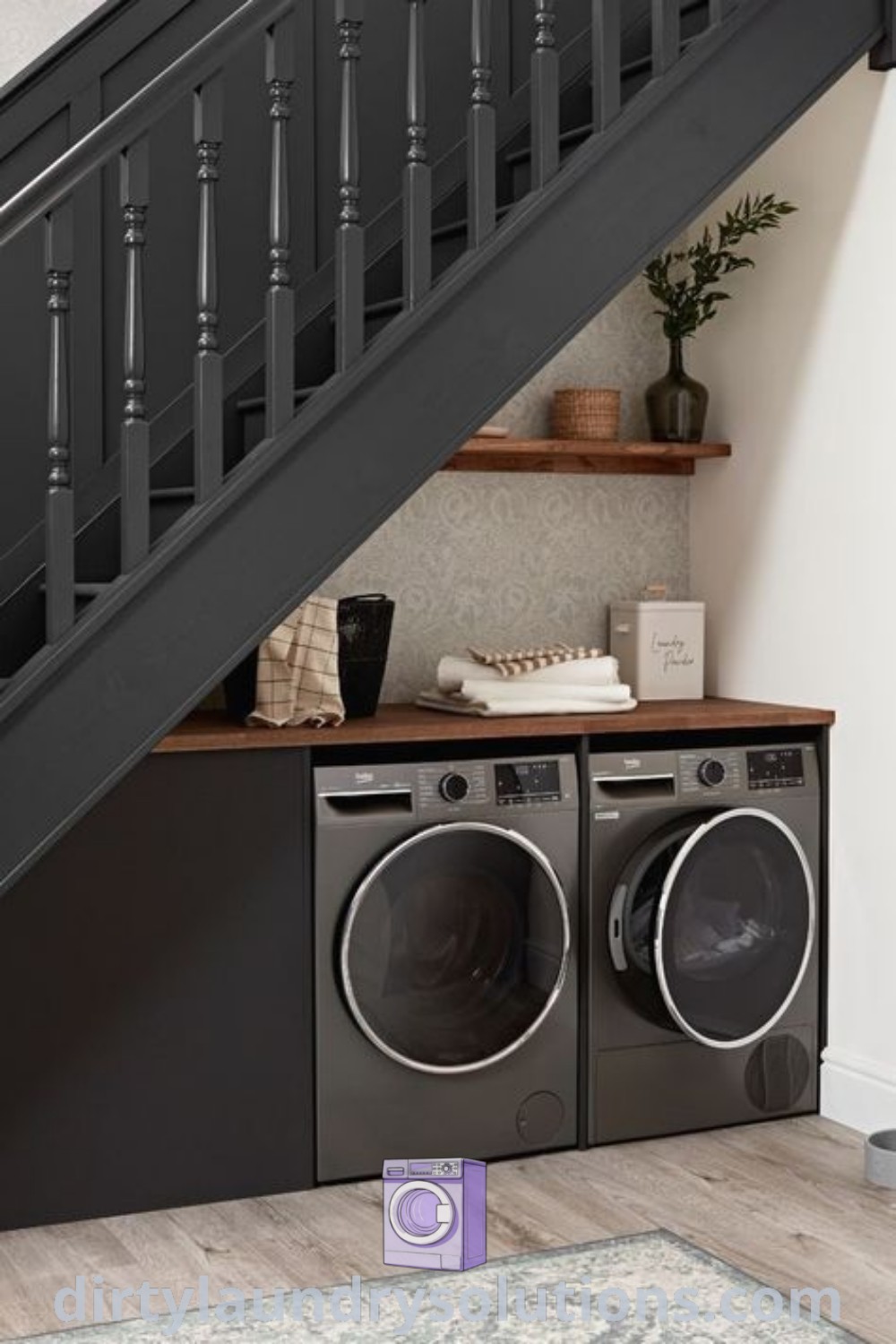 A cozy under stairs utility area featuring a washer and dryer, designed for hidden laundry solutions. Discover unique ideas and inspiring organization tips for optimizing small spaces at dirtylaundrysolutions.com.