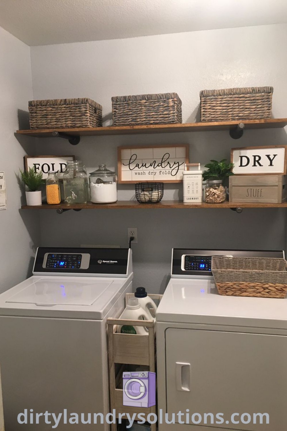 A cozy laundry room with a washer and dryer featuring shelves above them for storage, showcasing various organization ideas and modern rustic apartment decor. Find more inspiring solutions at dirtylaundrysolutions.com.