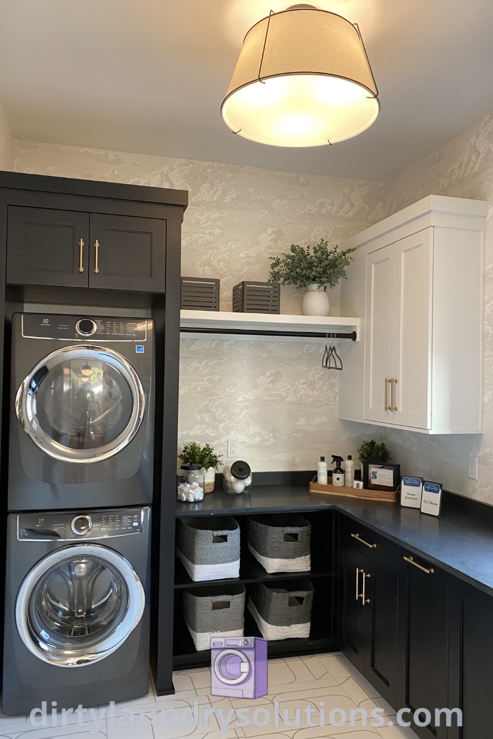 A kitchen pantry and laundry room combo featuring a washer and dryer on top of cabinets, showcasing a cozy aesthetic and efficient organization ideas for busy homes. Discover inspiration and solutions at dirtylaundrysolutions.com.