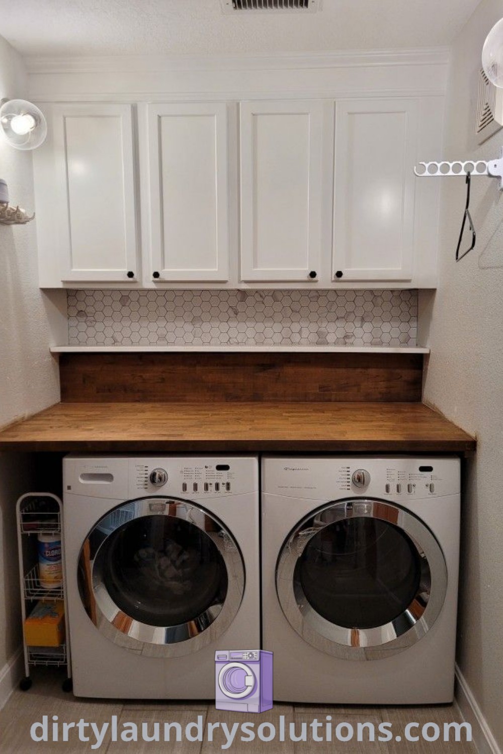 A cozy laundry room featuring a washer and dryer with white cupboards and a butcher block counter, exemplifying organization ideas and laundry room update inspirations. Discover more unique ideas for your home at dirtylaundrysolutions.com.