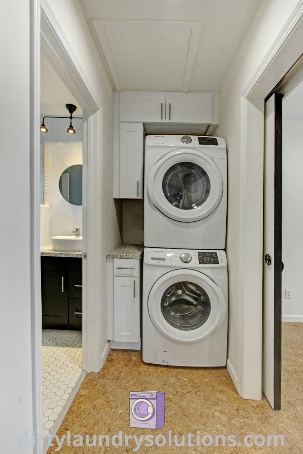 A cozy laundry room showcasing an in-unit washer and dryer, with organized shelves above, demonstrating effective laundry room ideas for small spaces. Discover more inspiring ideas and solutions for your home at dirtylaundrysolutions.com.