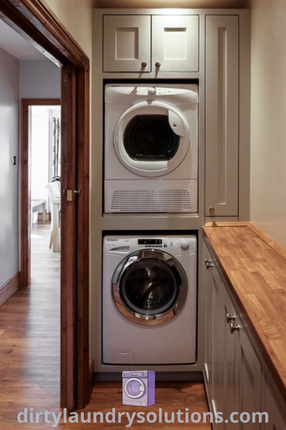 A cozy laundry room featuring a washer and dryer in a small space with wood flooring, exemplifying laundry room closet organization and decorative ideas. Find inspiring solutions for your home at dirtylaundrysolutions.com.