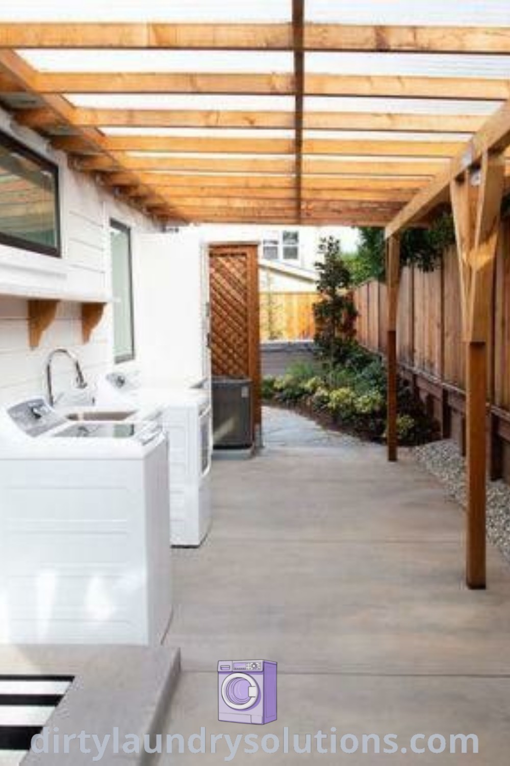 The outside of a house features a cozy outdoor laundry area with wood slats on the roof and white washers lined up, showcasing inviting outdoor laundry room ideas and practical solutions at dirtylaundrysolutions.com.