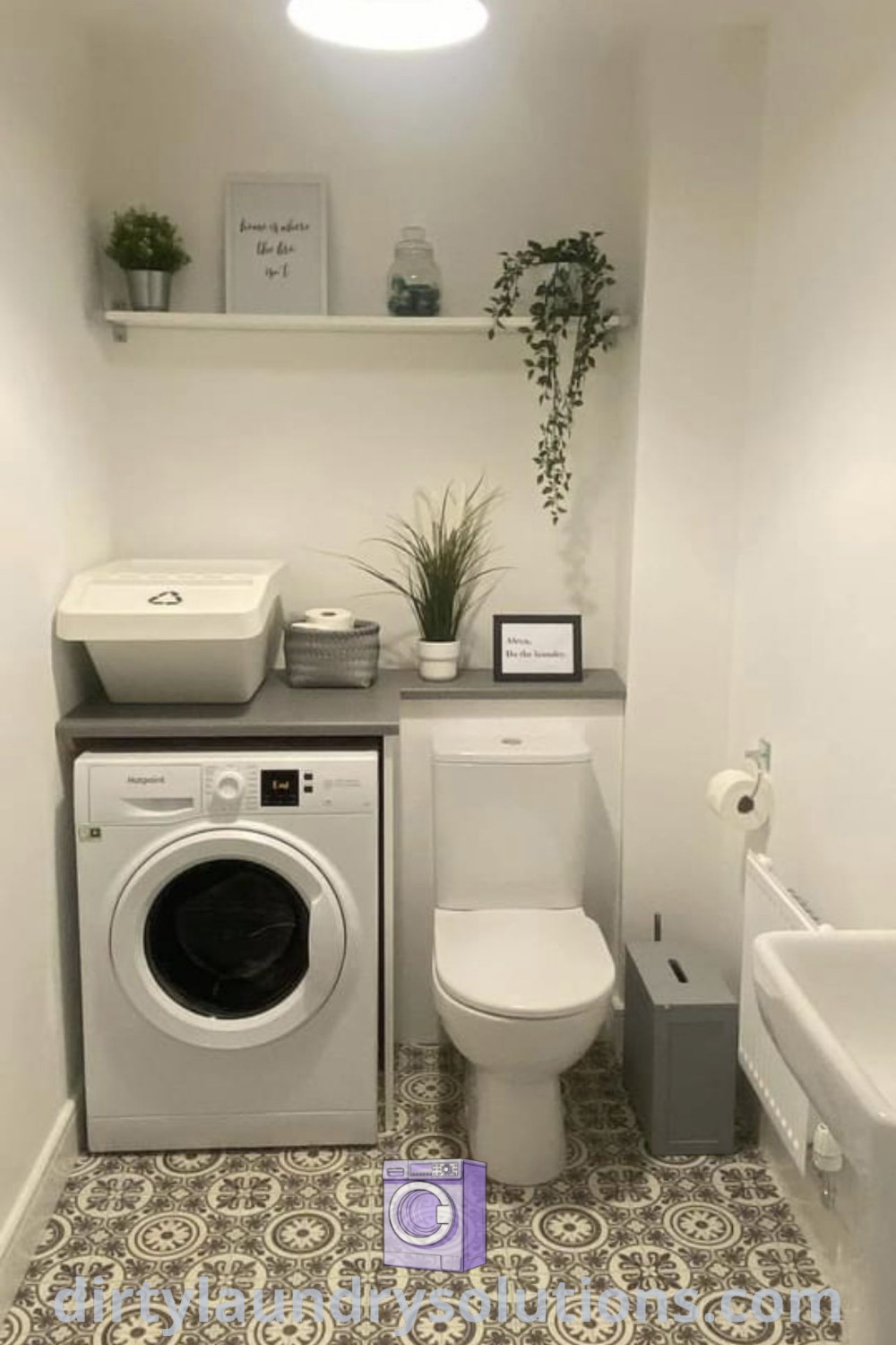 A small bathroom featuring a cozy laundry and mud room combo with a washer and dryer, tiled walls, and organized storage solutions for laundry. Discover unique design ideas and inspirations for your home at dirtylaundrysolutions.com.
