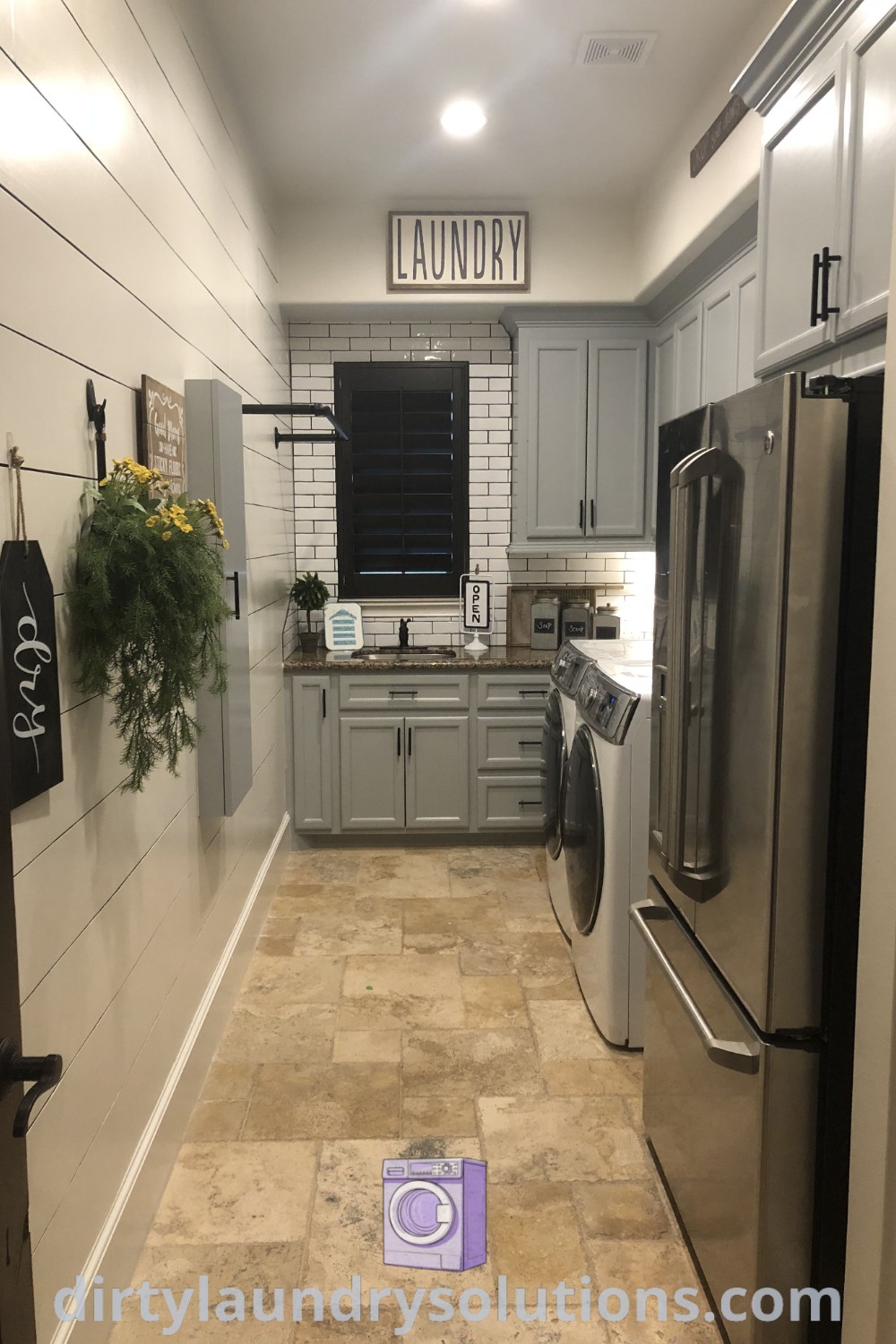 A clean and organized laundry room with a pantry, featuring washer and dryer, details of a refrigerator design, and smart solutions like laundry room and entry way combos. Discover practical ideas for your home at dirtylaundrysolutions.com.