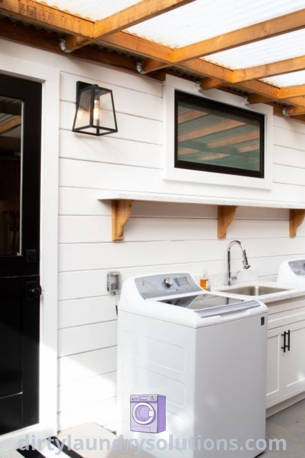 An outdoor kitchen featuring a washer and dryer, designed as an inviting outdoor laundry area. Explore creative outdoor laundry room decor and organization ideas at dirtylaundrysolutions.com.