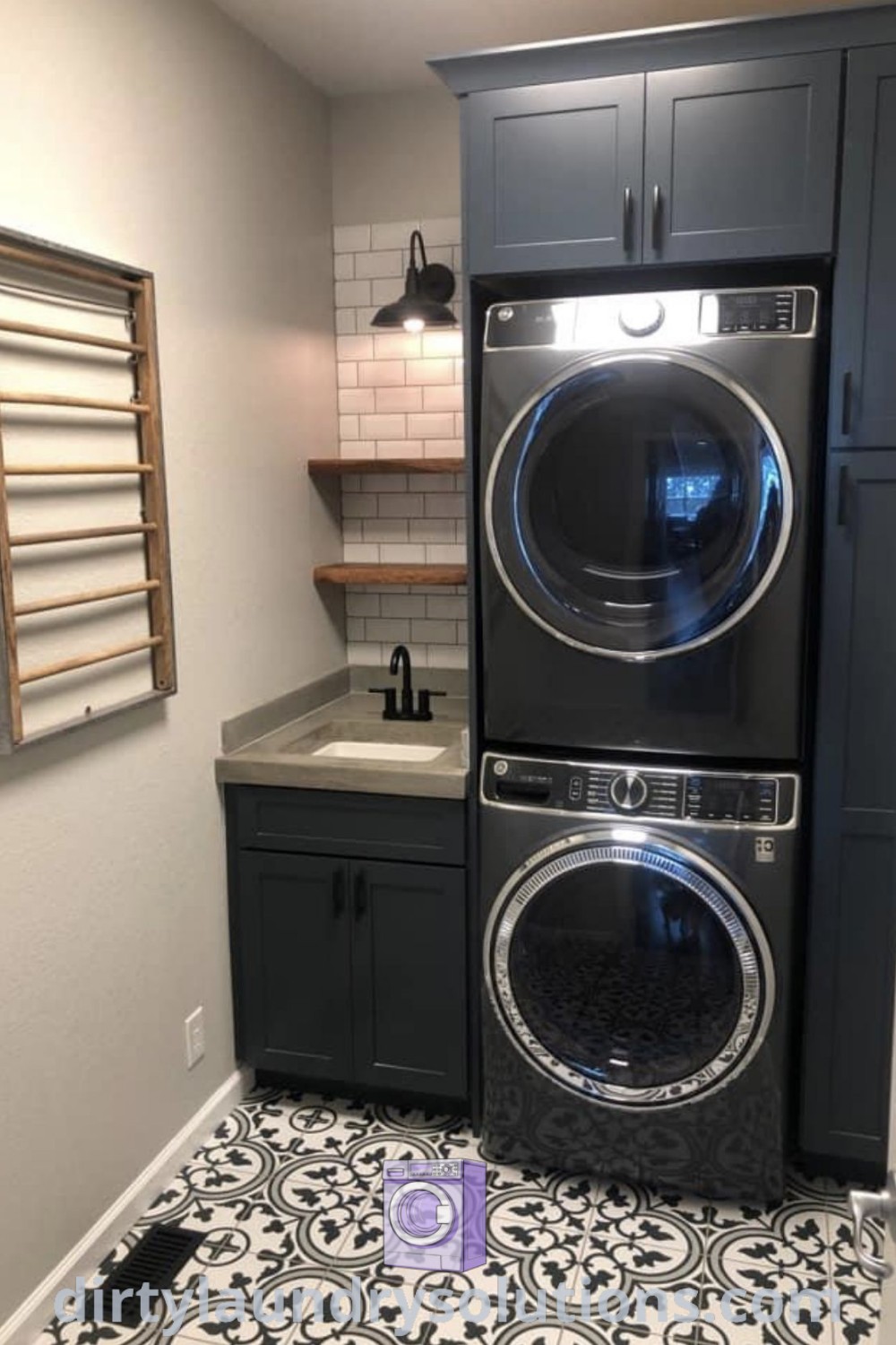 A small laundry room featuring a stacked washer and dryer with a utility sink, showcasing organization ideas and space-saving solutions for homes. Discover inspiring laundry room designs at dirtylaundrysolutions.com.