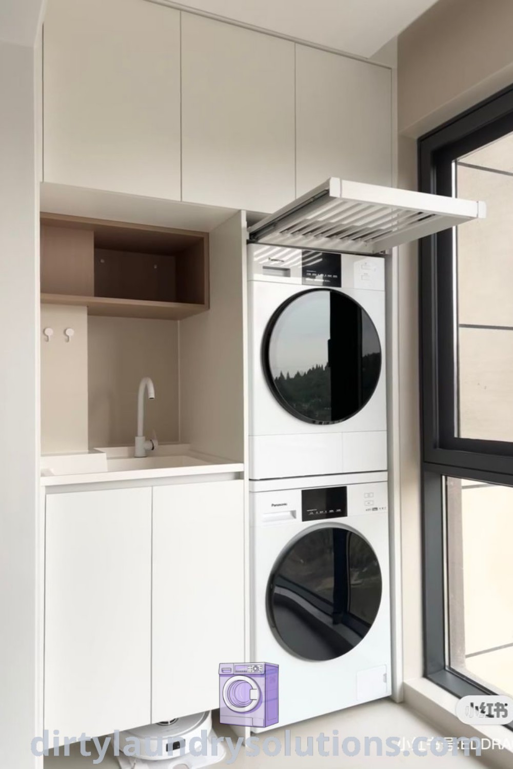 A cozy small laundry room with a washer and dryer next to a window, featuring open shelves for storage and showcasing organization ideas. Explore functional small laundry designs and inspirations at dirtylaundrysolutions.com.