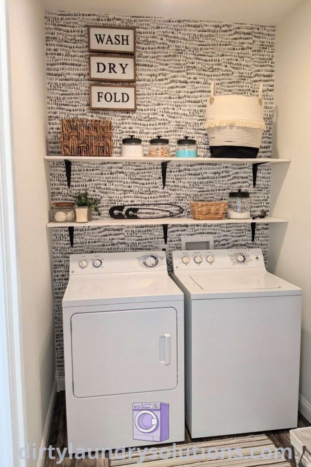 A cozy laundry room featuring a washer and dryer below shelves filled with towels, demonstrating efficient organization and stylish design ideas for small spaces. Discover more inspiring laundry room solutions at dirtylaundrysolutions.com.