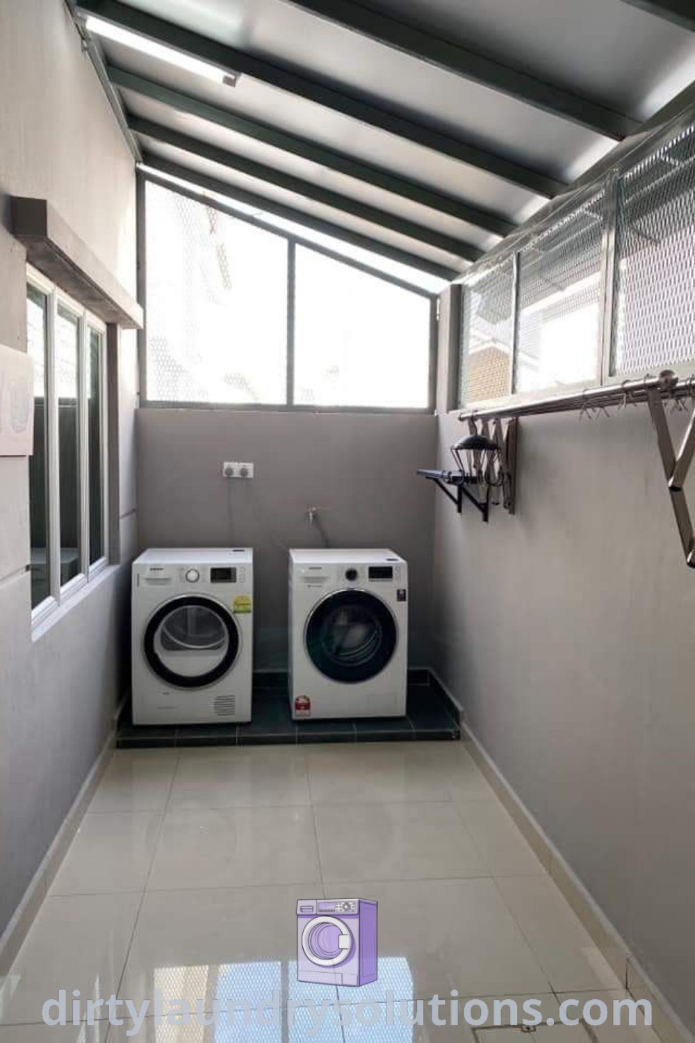 An outdoor laundry room showcasing two washers and a dryer, beautifully organized for functionality and style. Discover inspiring design ideas and cozy solutions for your home at dirtylaundrysolutions.com.