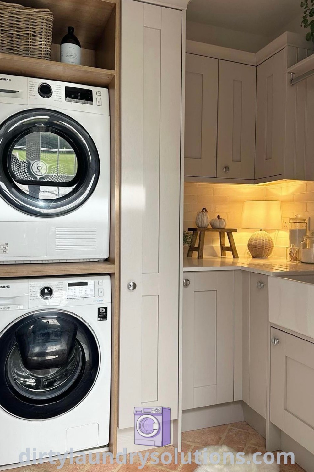A small laundry room featuring stacked washer and dryer, white cabinets on the wall, providing an organized and cozy space for laundry. Discover more inspiring and unique ideas for small spaces at dirtylaundrysolutions.com.