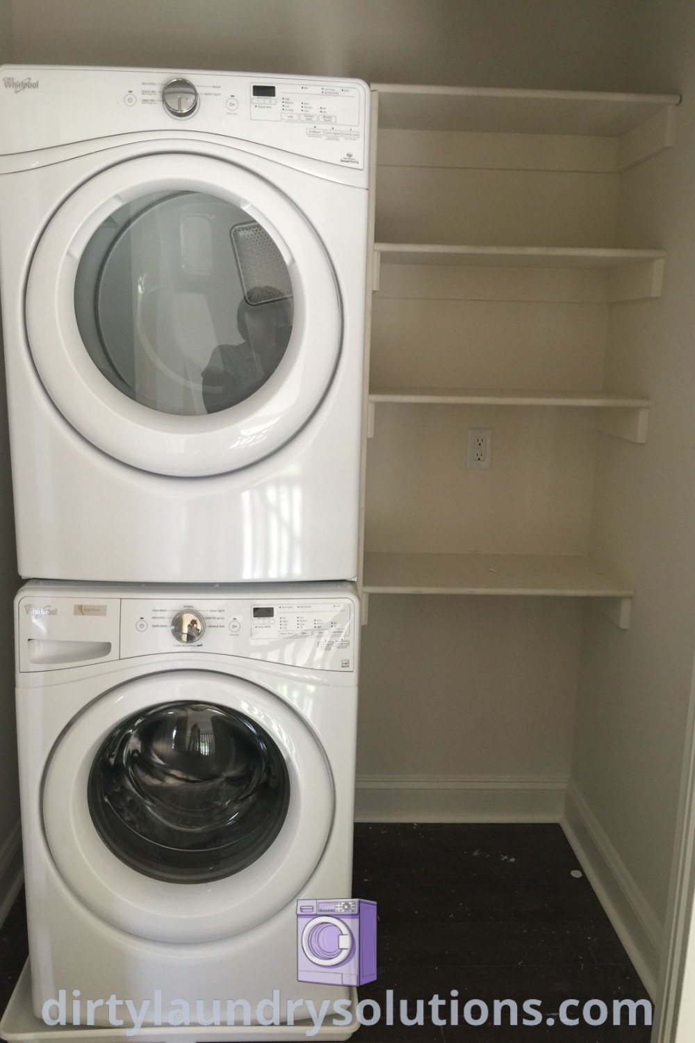 A cozy laundry room with a stacked washer and dryer in the corner, exemplifying storage next to stackable washer dryer solutions and offering organization ideas for small spaces. Discover more inspirations at dirtylaundrysolutions.com.