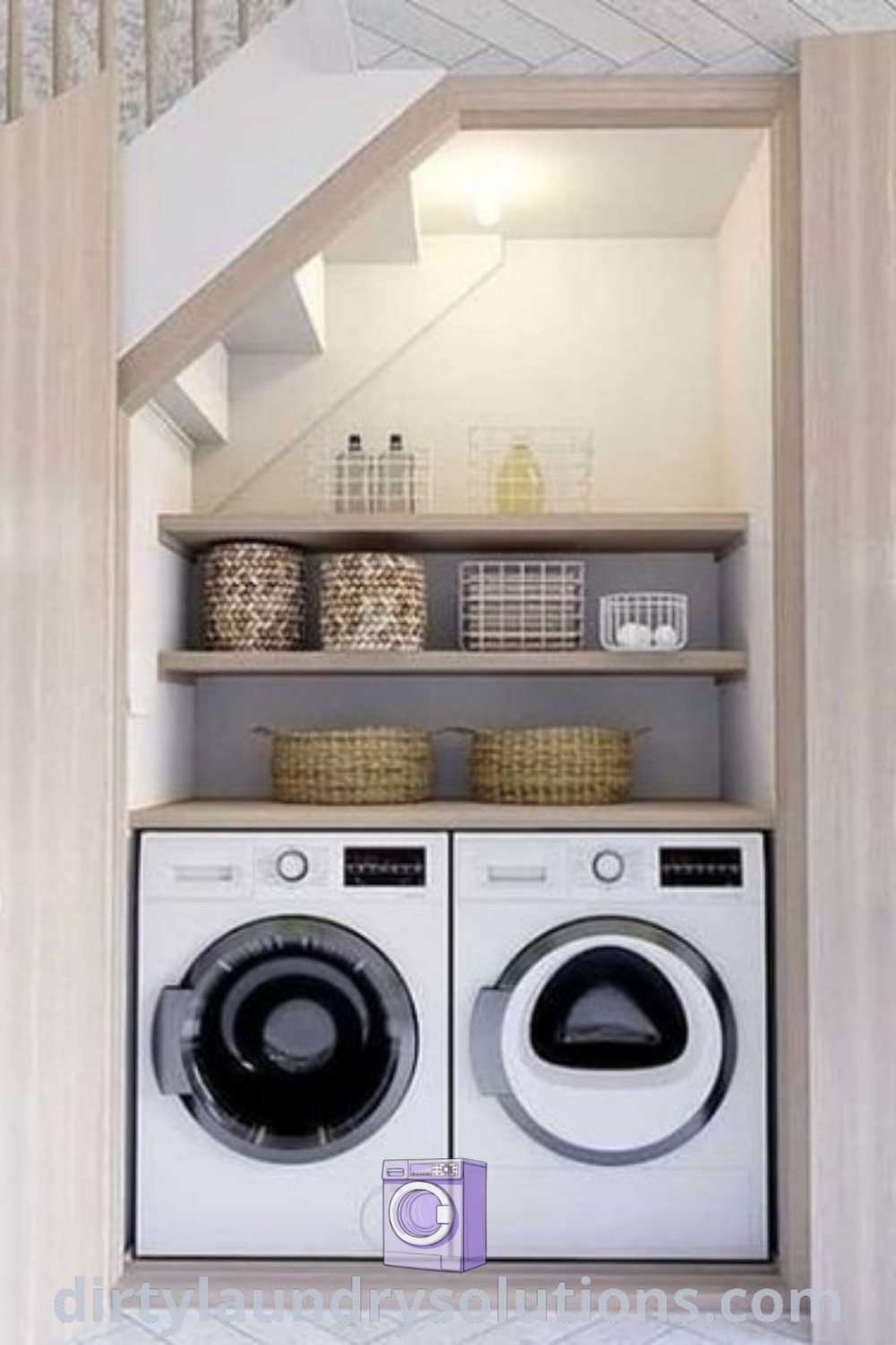 A washer and dryer located in a small under stairs utility room, showcasing efficient storage solutions and design ideas for tiny laundry spaces. Discover cozy laundry cupboard options and more inspirations at dirtylaundrysolutions.com.