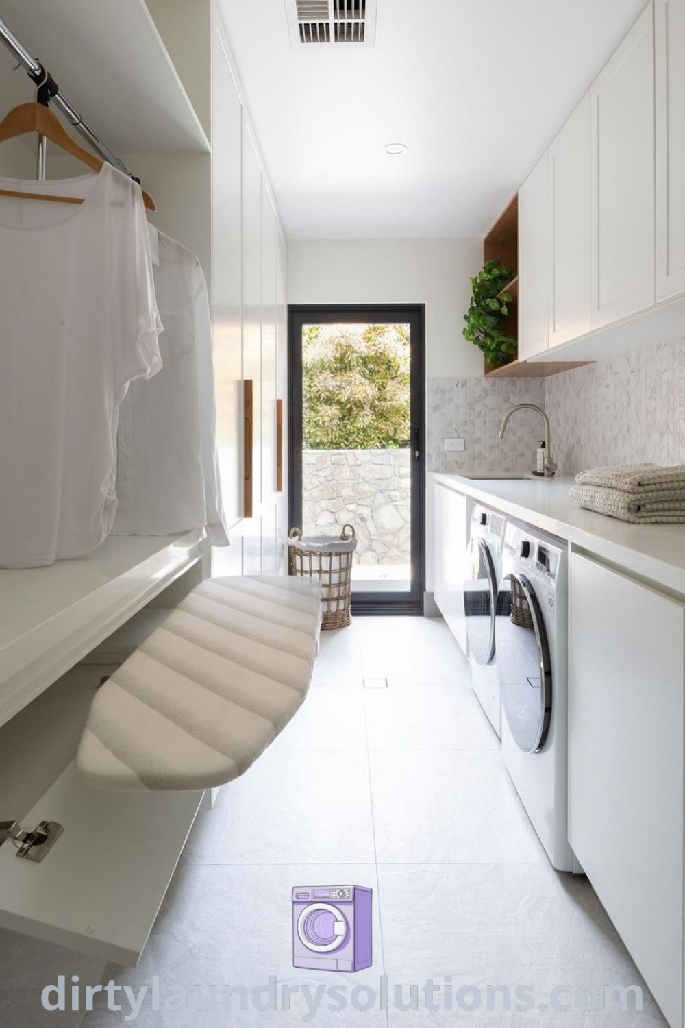 A beautifully designed laundry room with white walls and flooring, showcasing modern laundry ideas for a cozy and functional space. Explore more design inspirations and organization solutions at dirtylaundrysolutions.com.