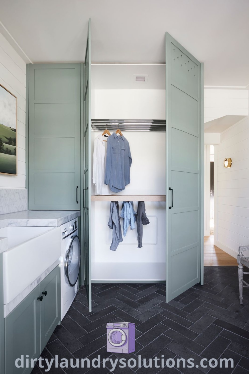 A cozy laundry room featuring a washer and dryer in a small space, highlighting effective organization ideas and beautiful decor. Discover inspiring solutions to freshen up your space at dirtylaundrysolutions.com.