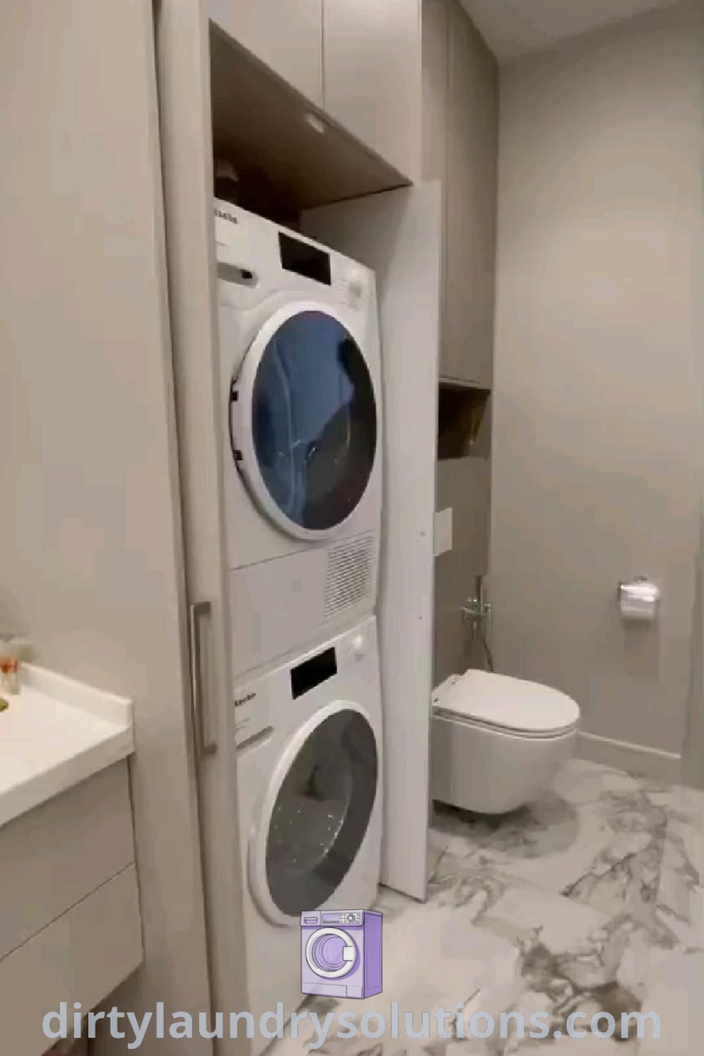 A hidden laundry machine in a bathroom, cleverly concealed within cabinetry, showcasing unique ideas for small spaces and inspiring designs to maximize functionality. Discover more tips and solutions for your home at dirtylaundrysolutions.com.